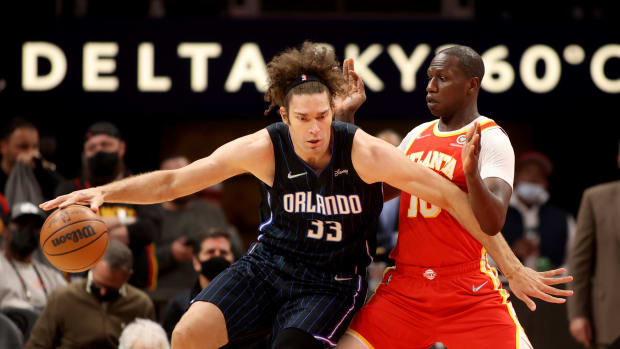 Orlando Magic center Robin Lopez (33) makes a move against Atlanta Hawks center Gorgui Dieng (10) during the first quarter at State Farm Arena.